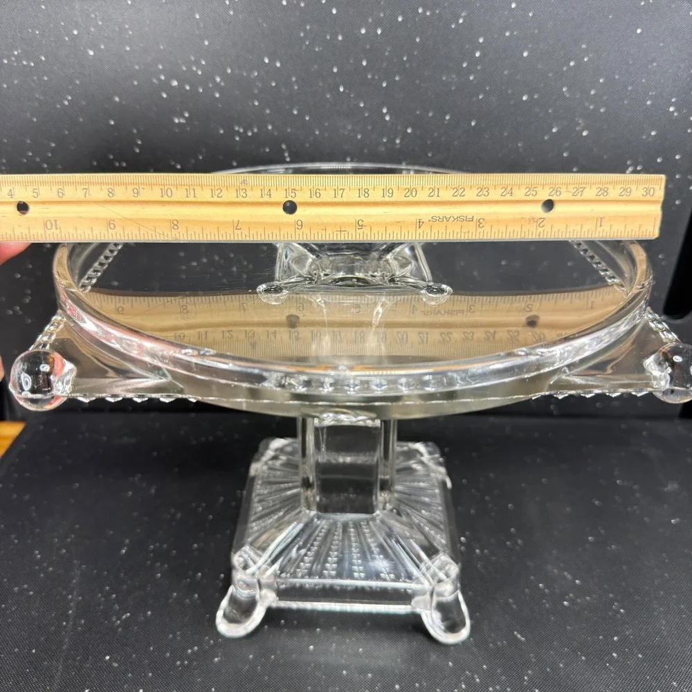 Antique Adams & Co Manganese Glow Glass Cake Stand 8in Tall 10in Wide Clear EAPG